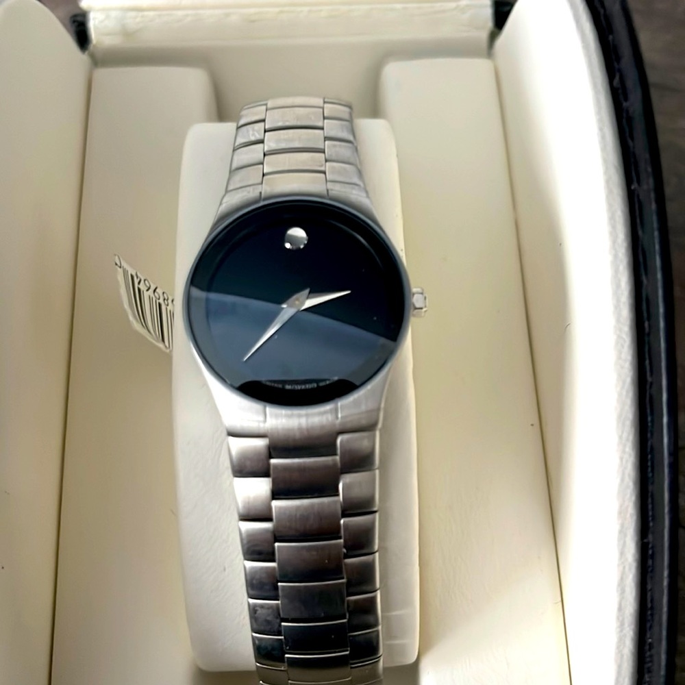 Womens brand new in box Movado watch 2-hand quartz chrome finish black dial